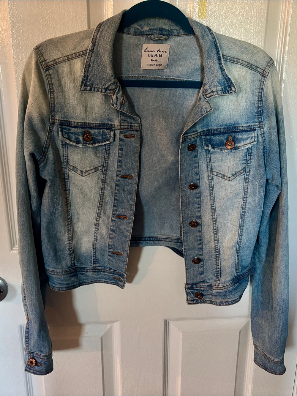 Love Tree light wash distressed denim jacket size small